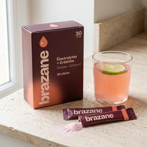 Boîte Brazane Électrolytes + Créatine Pastèque · Citron vert, deux sticks et un verre de boisson